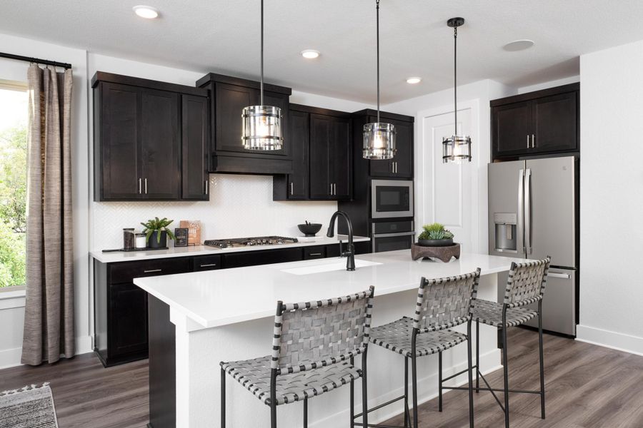 Representative furnished interior of a home built from the Sage by Tri Pointe Homes in Union Park, Little Elm (Image 4).