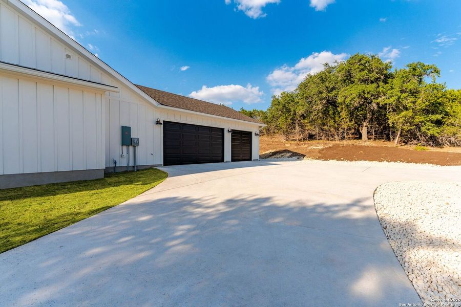 Exterior details and patio area of a home in , Boerne (Image 35).