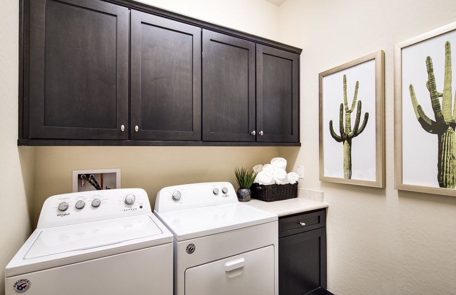 Laundry room with additional cabinet space