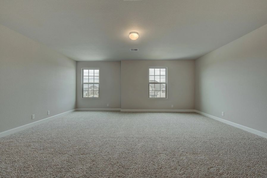 Representative unfurnished interior of a home built from the Cleburne by Ashton Woods in Mustang Oaks, San Antonio (Image 37).