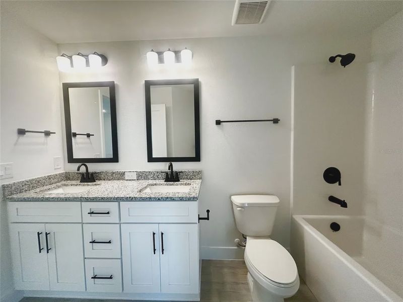 Furnished interior view inside a new home in Deep Creek, Punta Gorda (Image 10).