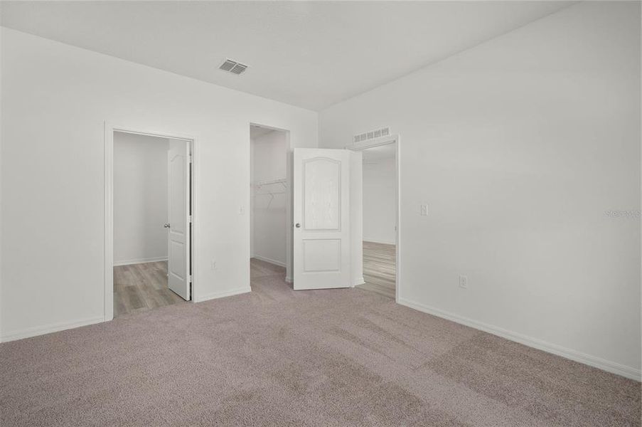 Spacious, unfurnished interior of a new home in Tula Parc, Astatula (Image 17).