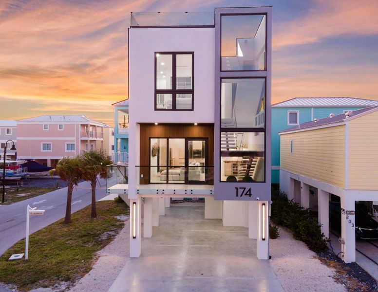 Front exterior of a new home in , Key Largo, FL, highlighting curb appeal (Image 22).