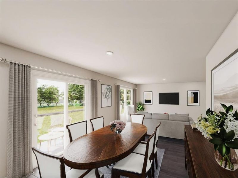 Dining area with recessed lighting and dark wood-style floors Dining area with recessed lighting and dark wood-style floors