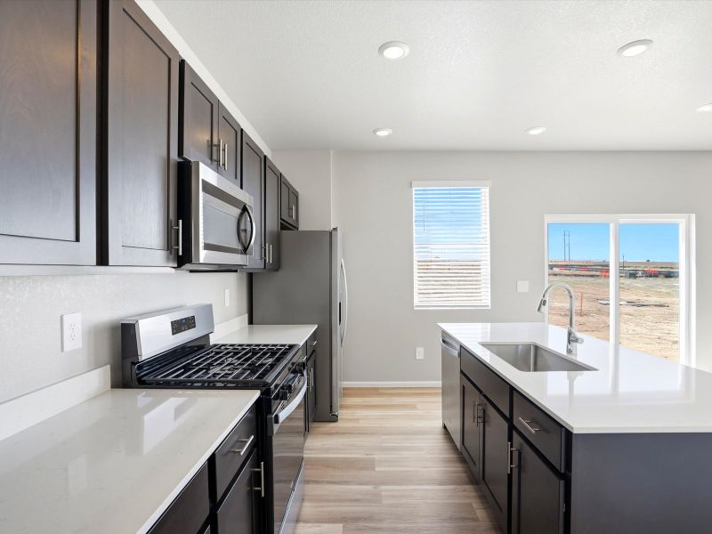 Furnished interior view inside a new home in Lorson Ranch: The Trail Collection, Colorado Springs (Image 3).