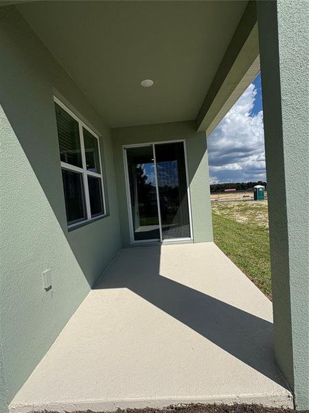 Exterior details and patio area of a home in Oakview, Apopka (Image 2).