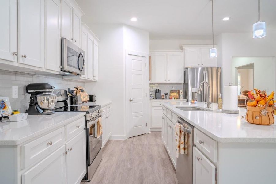 Furnished interior view inside a new home in Crossing Creeks, Monroe (Image 8).
