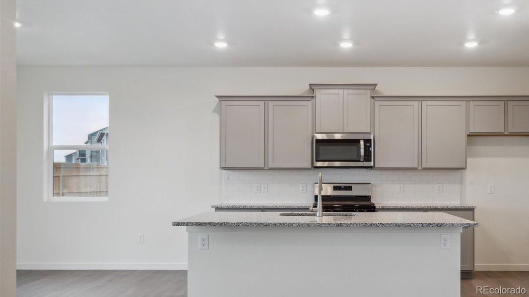 Furnished interior view inside a new home in Silver Peaks, Lochbuie (Image 5).