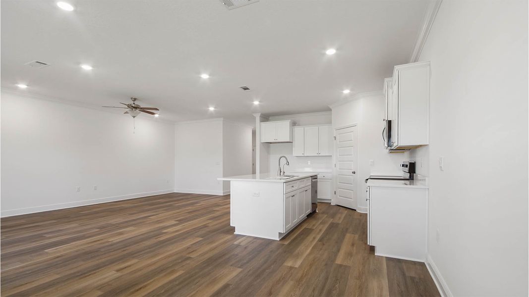 Representative unfurnished interior of a home built from the Delray by D.R. Horton in Caballeros Estates At Hombre, Panama City Beach (Image 29).