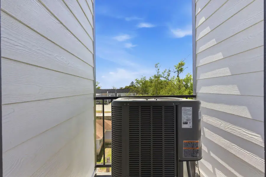 Exterior details and patio area of a home in , Houston (Image 3).