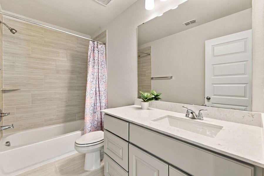 Furnished interior view inside a new home in The Highlands, Porter (Image 11).