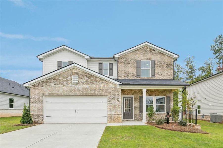 Front exterior of a new home in Preserve at Mountain Creek, Pendergrass, GA, highlighting curb appeal (Image 1). Front exterior of a new home in Preserve at Mountain Creek, Pendergrass, GA, highlighting curb appeal (Image 1).