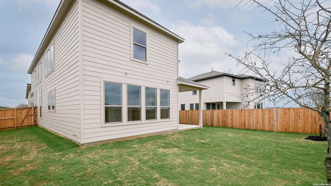 Exterior details and patio area of a home in The Parklands, Schertz (Image 22).