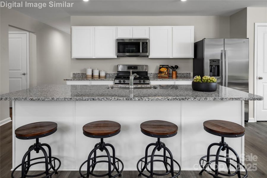 The Large Kitchen island is a perfect gathering area for meals or entertaining. The Large Kitchen island is a perfect gathering area for meals or entertaining.