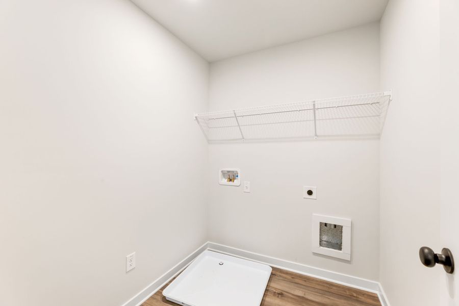 A white room with a white wall and a white door. A white room with a white wall and a white door.