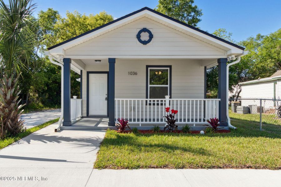 Front exterior of a new home in , Jacksonville, FL, highlighting curb appeal (Image 14).