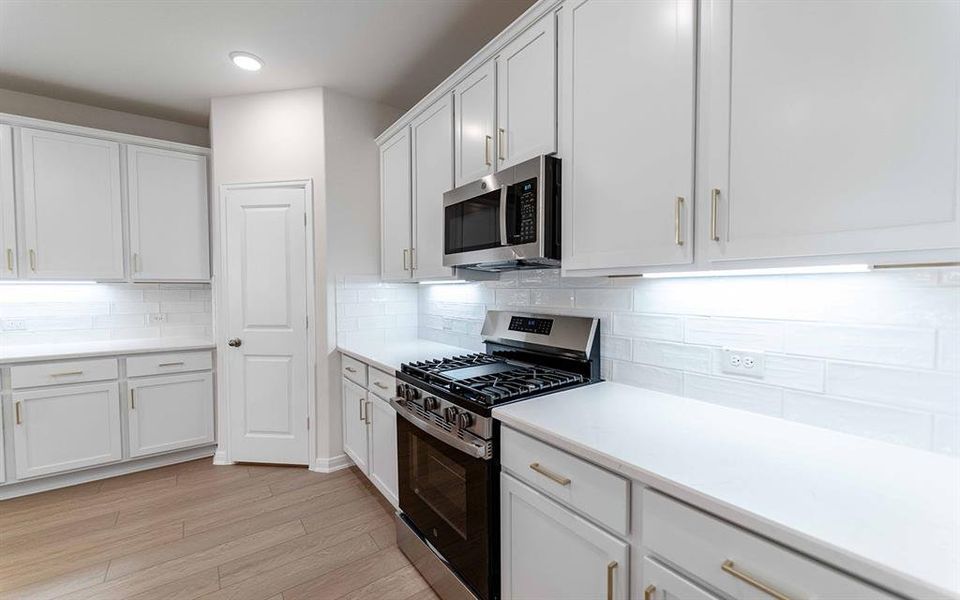 Furnished interior view inside a new home in La Terra, Celina (Image 10). Furnished interior view inside a new home in La Terra, Celina (Image 10).