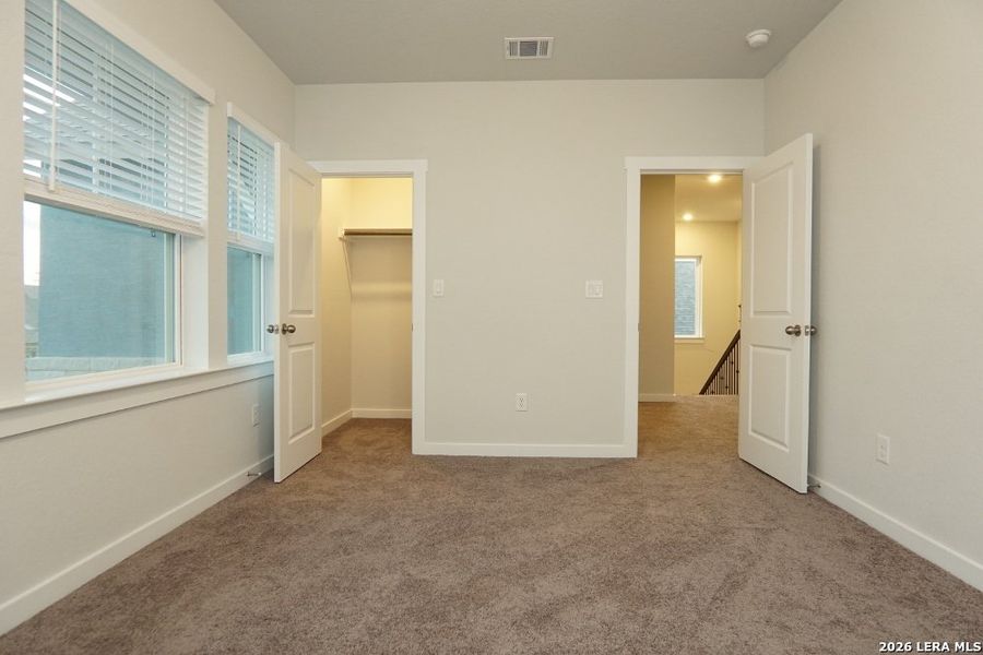 Spacious, unfurnished interior of a new home in Ladera - High Point 45', San Antonio (Image 36).