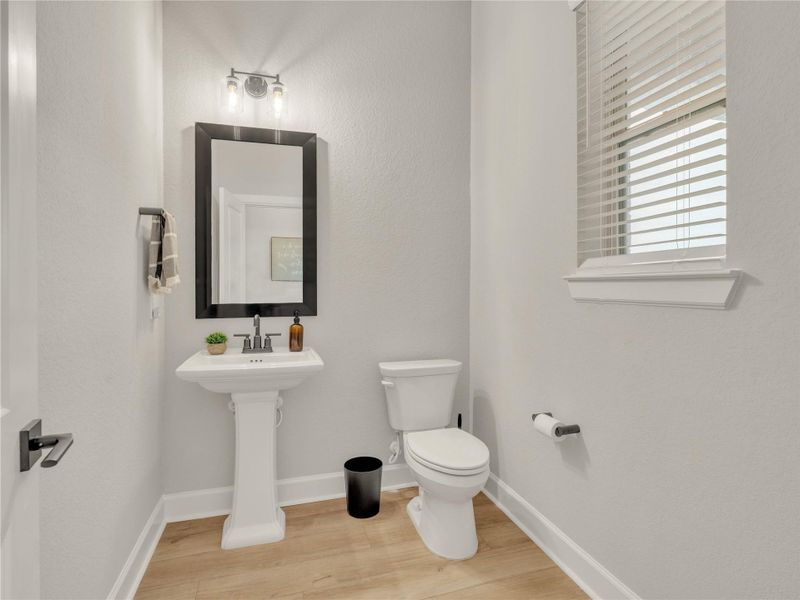 Half Bath Downstairs next to living room and formal dining Half Bath Downstairs next to living room and formal dining