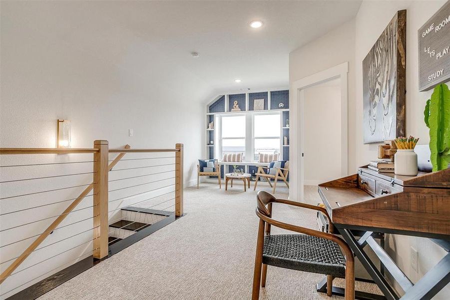 Office area with carpet and recessed lighting