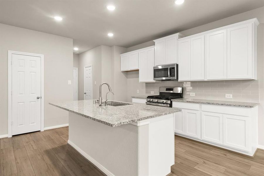 This kitchen is not only a functional space but also has ample storage. Whether you're a seasoned chef or just love to gather and enjoy good food, this kitchen is a dream come true.