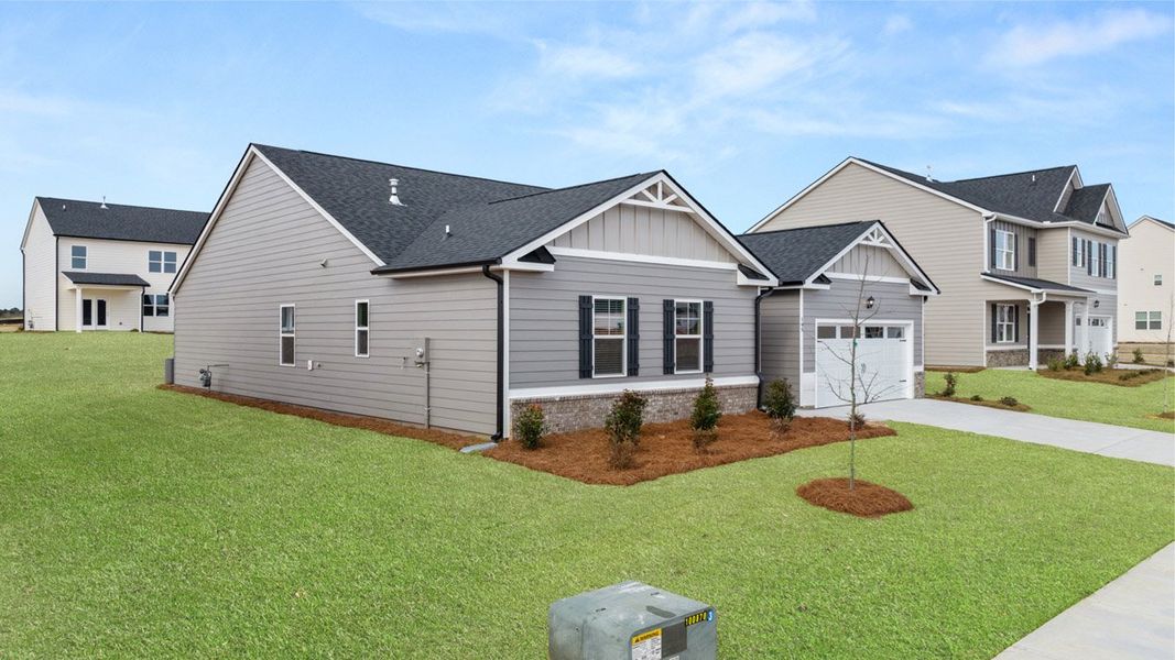 Front exterior of a new home in Bridle Creek, Locust Grove, GA, highlighting curb appeal (Image 2).