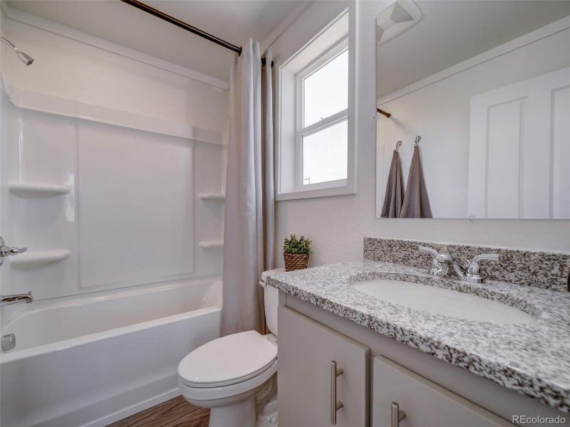 Furnished interior view inside a new home in , Commerce City (Image 20).