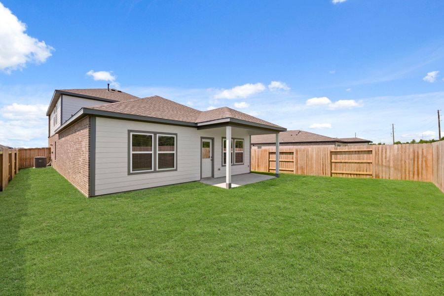 Exterior details and patio area of a home in River Ranch Trails, Dayton (Image 21). Exterior details and patio area of a home in River Ranch Trails, Dayton (Image 21).