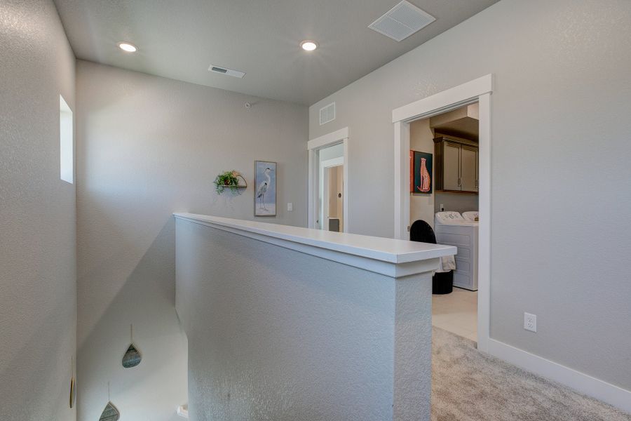 Furnished interior view inside a new home in Highlands at Fox Hill, Longmont (Image 29). Furnished interior view inside a new home in Highlands at Fox Hill, Longmont (Image 29).