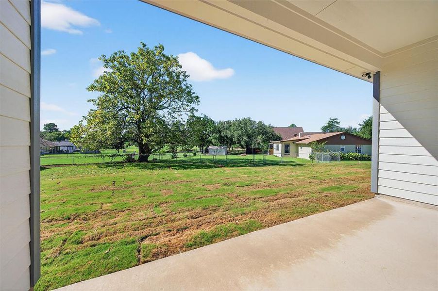 View of yard with a patio