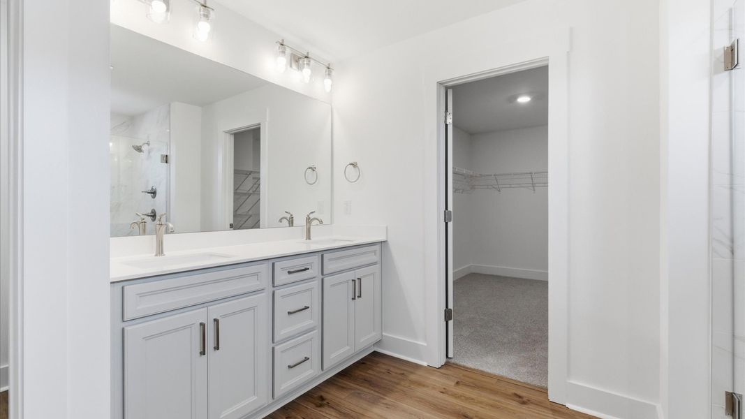 First-rate primary bathroom offering an elegant walk-in shower and dual sinks with superior style in Gray Court, SC