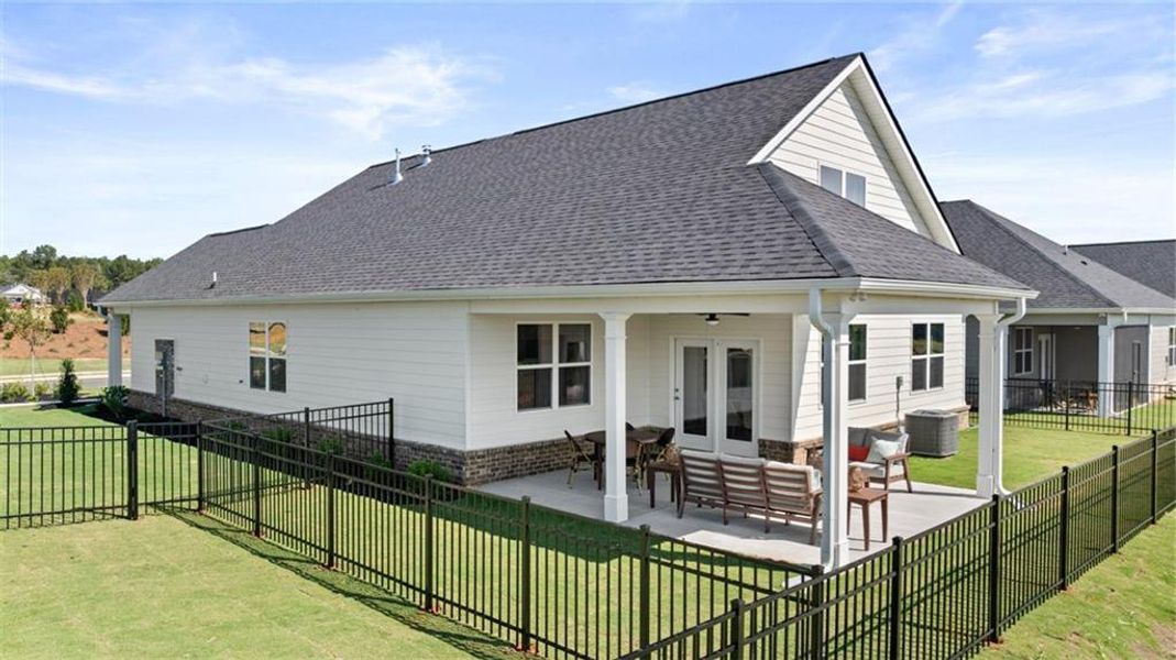 Exterior details and patio area of a home in Oak Ridge Meadows, Locust Grove (Image 3). Exterior details and patio area of a home in Oak Ridge Meadows, Locust Grove (Image 3).