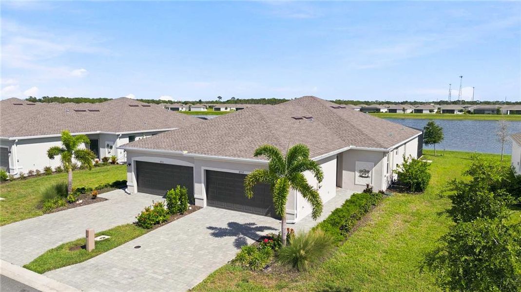 Front exterior of a new home in , Englewood, FL, highlighting curb appeal (Image 24). Front exterior of a new home in , Englewood, FL, highlighting curb appeal (Image 24).