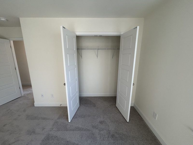 Spacious, unfurnished interior of a new home in Miller's Reserve, Winston-Salem (Image 54).