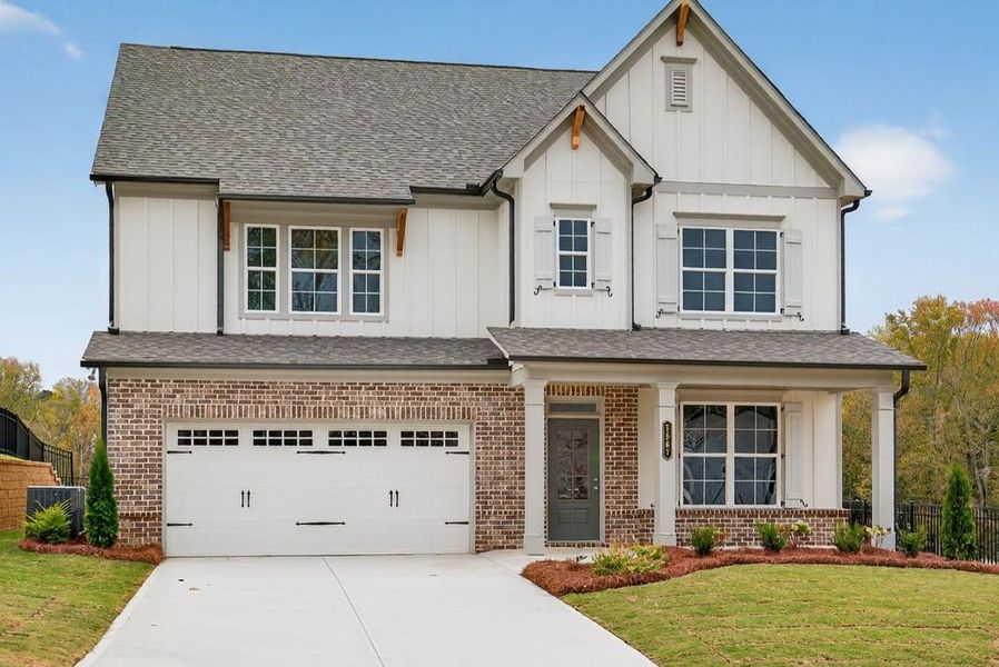 Front exterior of a new home in Hemingway, Flowery Branch, GA, highlighting curb appeal (Image 20).