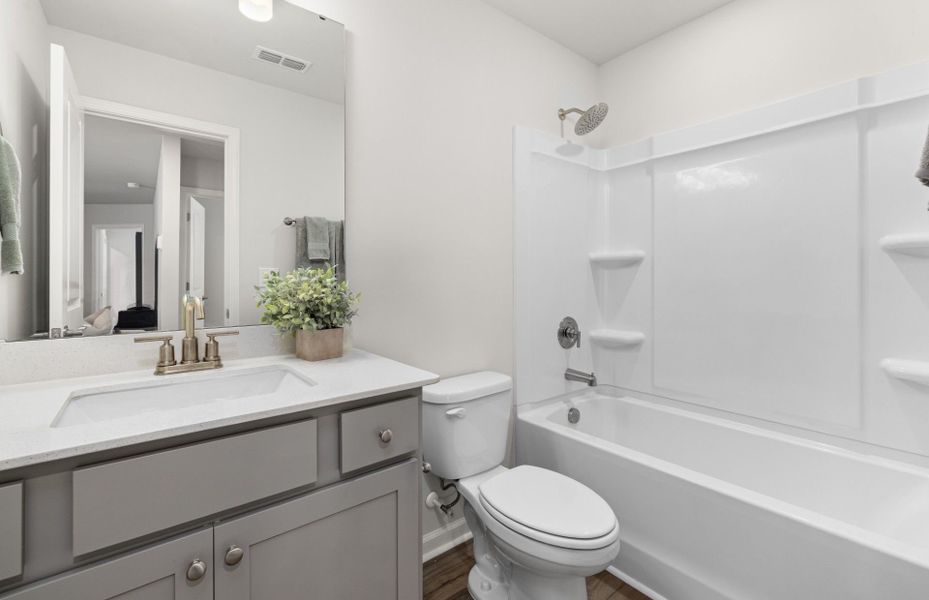 Furnished interior view inside a new home in Carpenter Falls, Durham (Image 12).