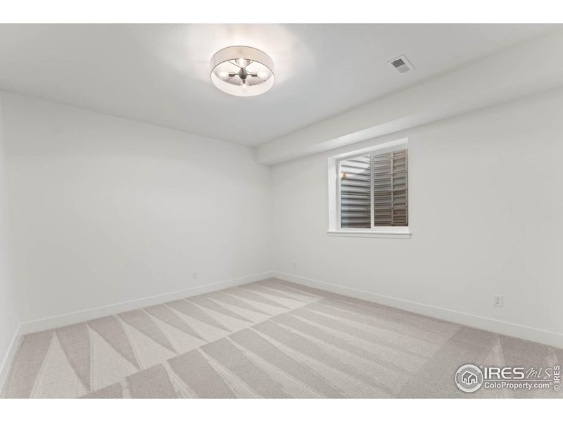 Spacious, unfurnished interior of a new home in Greenspire At Windsor Lake, Windsor (Image 28).