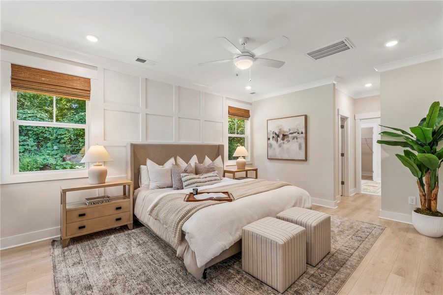 This airy bedroom features abundant natural light This airy bedroom features abundant natural light
