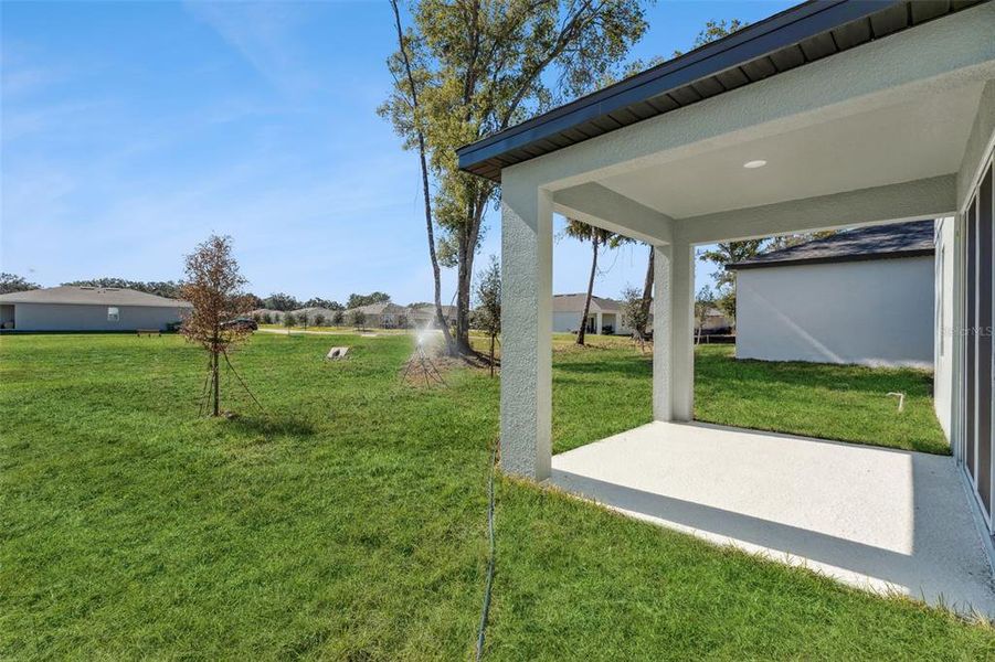 Exterior details and patio area of a home in Estes Reserve, Eustis (Image 14).