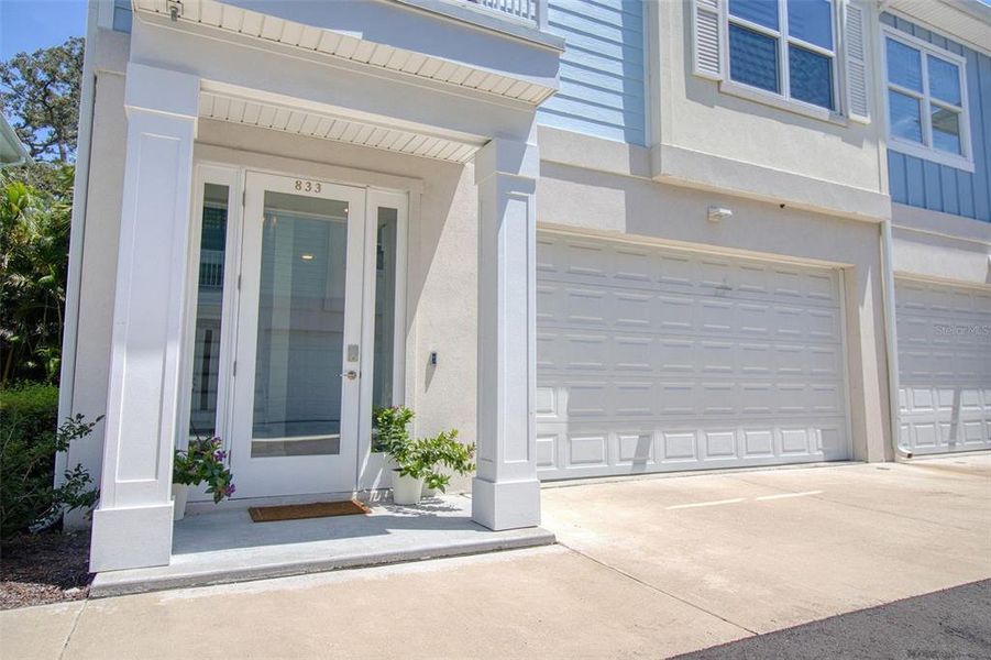 Front exterior of a new home in , Dunedin, FL, highlighting curb appeal (Image 21).