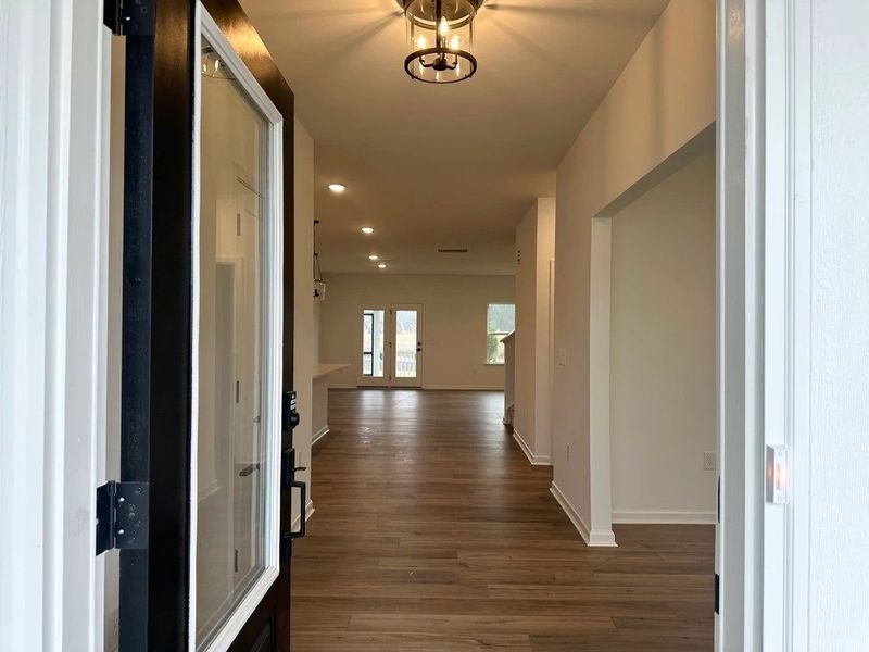 Foyer featuring the AW Collection® Harmony - A refined welcome with soft light and style. Foyer featuring the AW Collection® Harmony - A refined welcome with soft light and style.