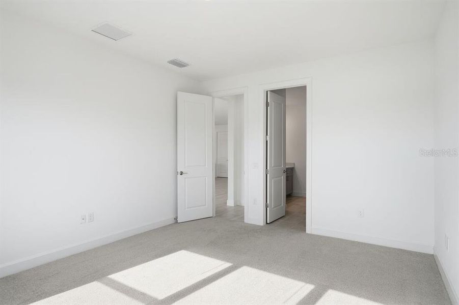 Spacious, unfurnished interior of a new home in Esplanade at Westview, Kissimmee (Image 17).