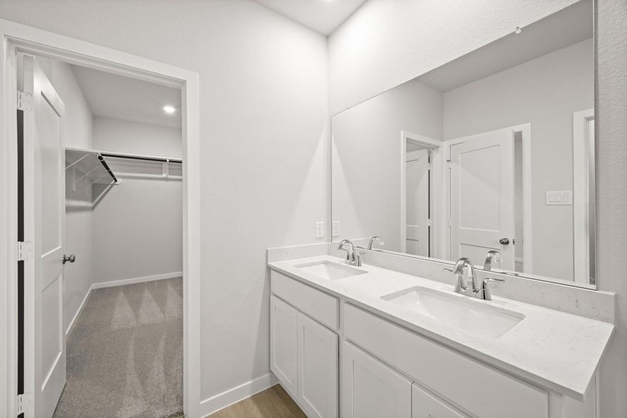 Furnished interior view inside a new home in Sunterra, Katy (Image 11).