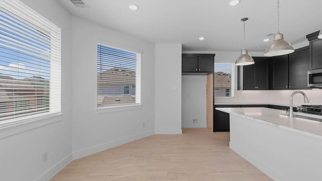 Representative furnished interior of a home built from the Oakdale by Chesmar Homes in Bridgeland Courtyard, Cypress (Image 11).