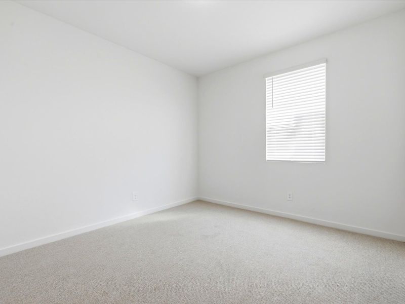 Spacious, unfurnished interior of a new home in Mesquite Mountain Ranch at Frontera, Surprise (Image 16).