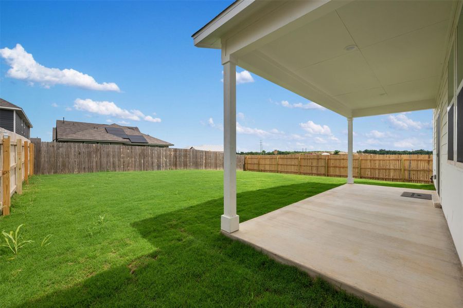 Exterior details and patio area of a home in Rolling Glen, Hutto (Image 15).