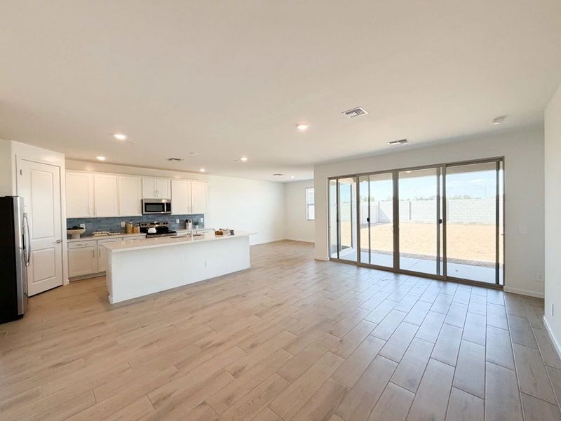 Great room, kitchen and dining