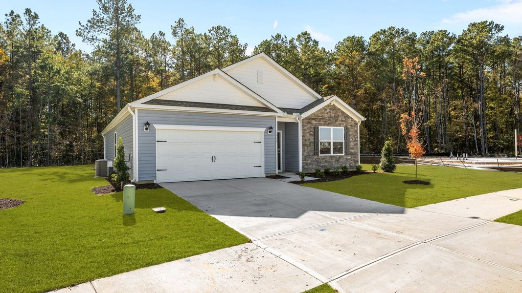 Front exterior of a new home in West New Bern, New Bern, NC, highlighting curb appeal (Image 17).