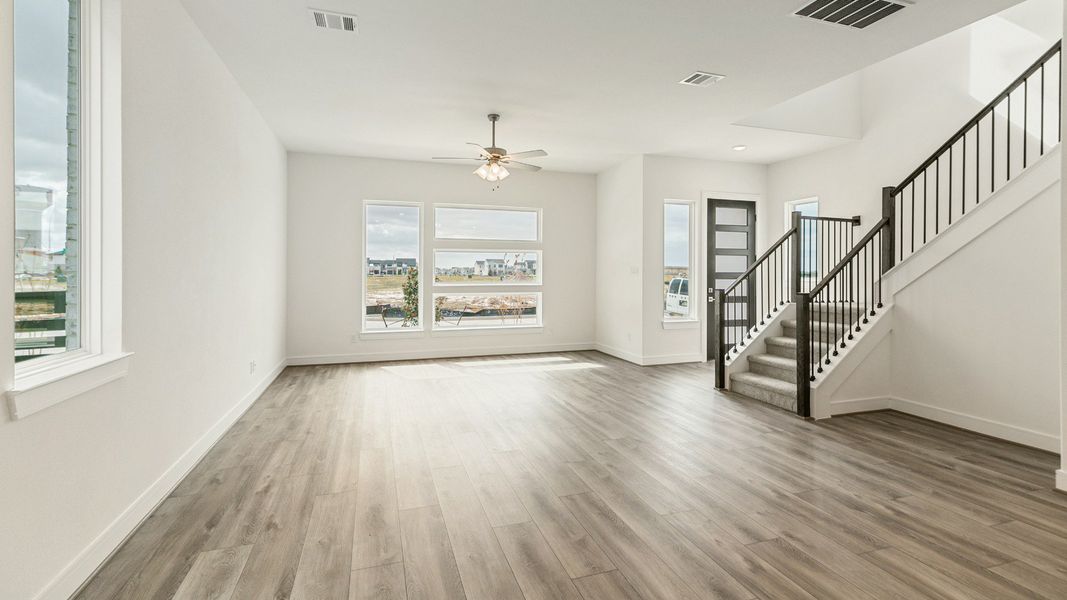 Representative furnished interior of a home built from the Valencia by Brightland Homes in Bridgeland Central, Cypress (Image 6).