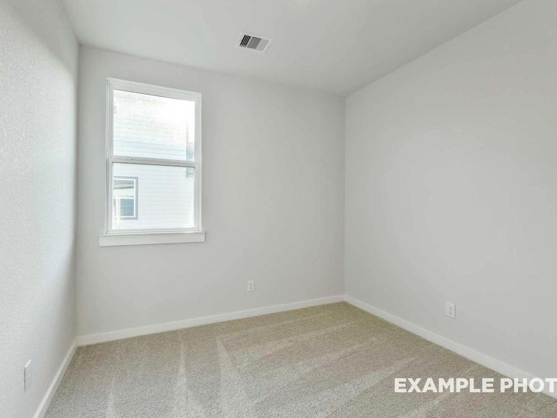 Spacious, unfurnished interior of a new home in Caney Creek Place, Conroe (Image 24).